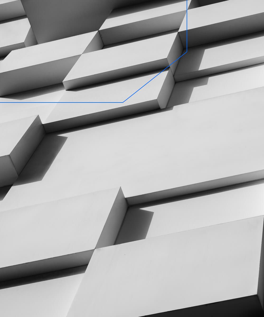 Abstract white 3D wall pattern with shadowed rectangular panels in modern architecture - Neutrinos