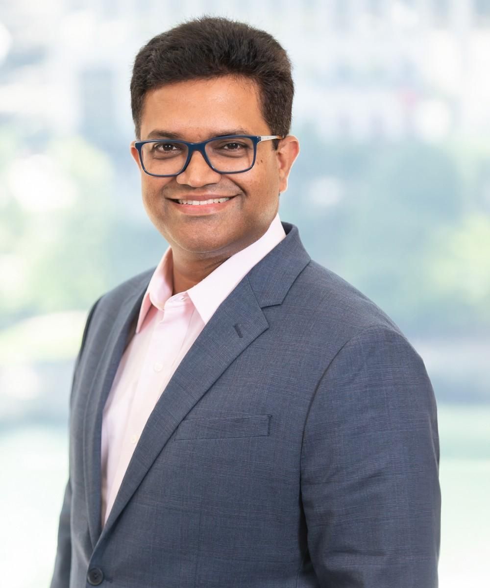 Ashish Jha, Chief Marketing and Strategy Officer at Neutrinos, in professional headshot - Neutrinos