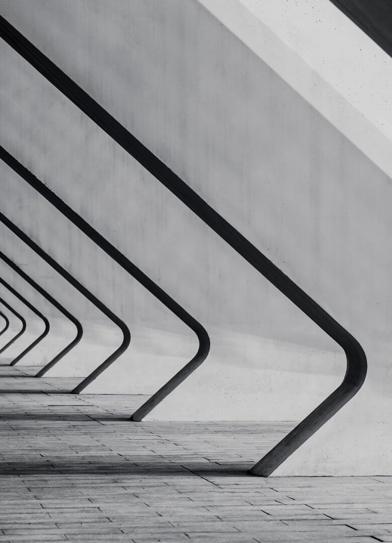 Abstract black and white architectural design with angled supports and rhythmic shadows - Neutrinos